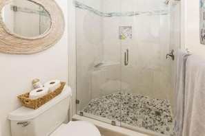 Gorgeous walk-in shower with designer tile
