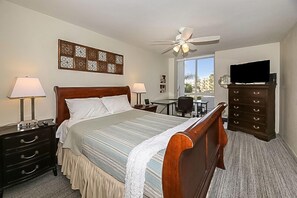 Queen bed, large desk, and flat screen TV