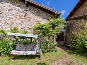 Plant, Building, Outdoor Bench, Azure, Shade, Outdoor Furniture, Sky, Cloud, House, Grass