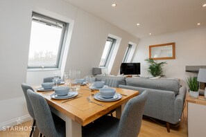 Large living room with lounge & dining area