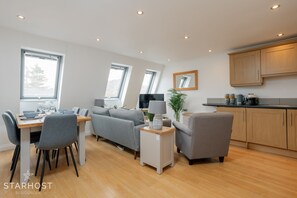 The large windows create a bright, airy environment