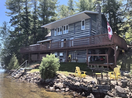 Cottage and lakeside firepit - view from dock