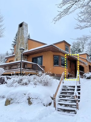 The entrance of this 1 bedroom is true ski on off with the bunny slope right on the front steps. The Bretton Woods ski resort and gondola are a few steps away from this Forest Cottage vacation