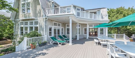 Back deck with grill.  Overlooking nature preserve and ocean.