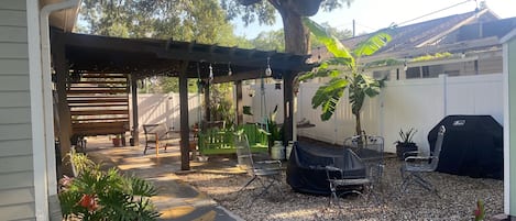 Patio with TV, Weber BBQ gas grill, firepit and more