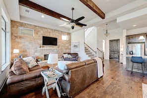 Living room with 3 couches for ample seating