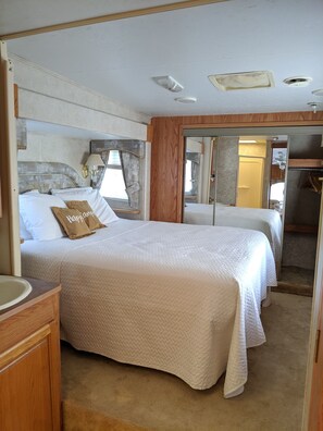 Queen bed is located in it's own upper level
