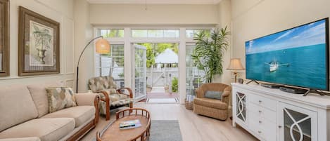 CARIBBEAN CHARM is a classic island townhome is located within Truman Annex, Key West's most exclusive gated community...