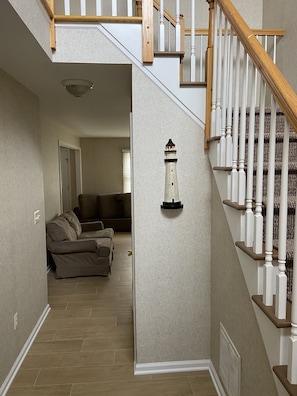 Entry way and stairs to second floor where bedrooms are located.