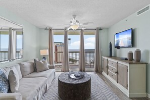 Living room boasts amazing views, sleeper sofa, and Roku TV