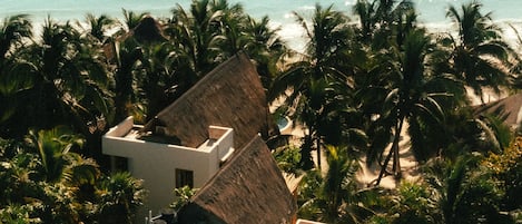 Casa de las Palmas luxury villa on an exclusive beachfront property in Tulum.