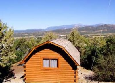 Rustic log Cabins in the foothills of the San Juan Mountains 