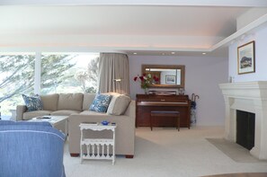 Living Room with Piano & Fireplace