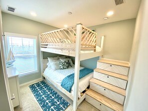 Queen over Queen bunk beds (with comfortable mattresses!) Plus XL Twin trundle.
