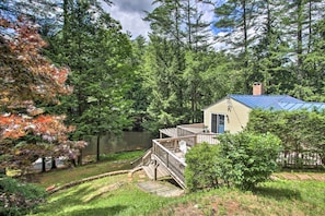 The vacation rental is set on a river leading to the Weare Reservoir.