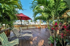 Huge waterfront sun deck with fishing rod holders.  