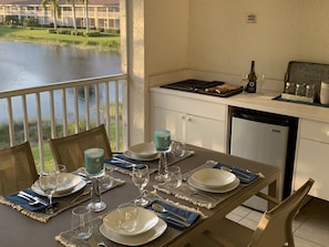 Sunset dinners with food off the grill and bar refrigerator to keep drinks cold.