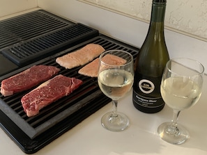 Cook your favorite fish or meat on the outdoor electric grill.