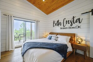 Master Bedroom: Enjoy breathtaking bedroom views and step right onto the back deck.