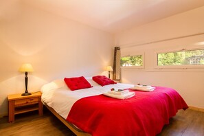 Master bedroom with a double bed