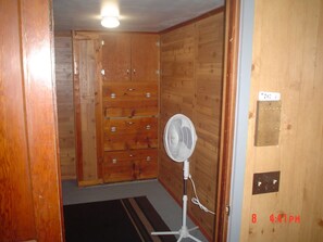 Master bedroom clothing drawers built in.