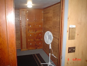 Master bedroom clothing drawers built in.