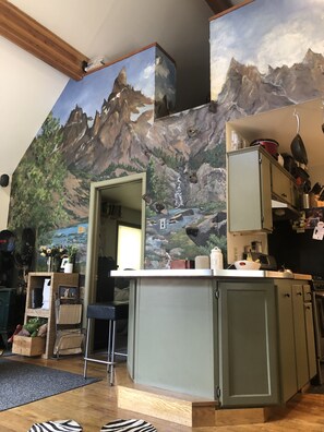 living room and mountain mural