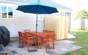 A patio table for 6 and a full size propane grill is ready for your cookouts!