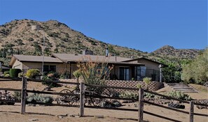 House is on a hill overlooking Yucca Valley
