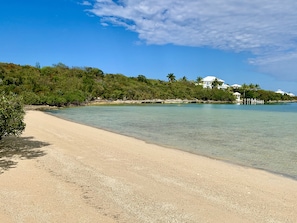 The beach right down to the left from our property about a two minute walk.