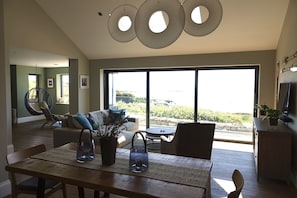 View from Kitchen into Lounge and Snug 