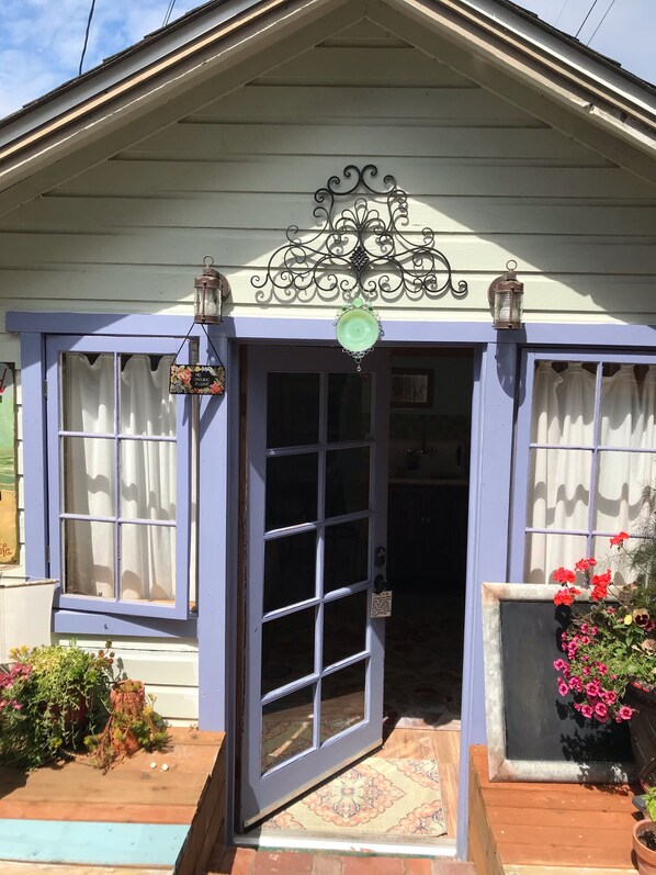 Entrance to the cottage off of your private deck.Two steps down.