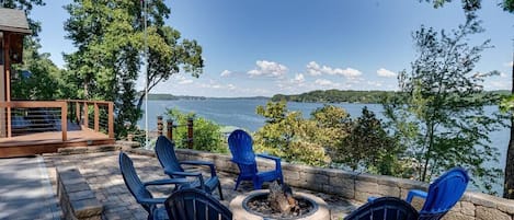 Sit out on the patio by the firepit overlooking the lake.