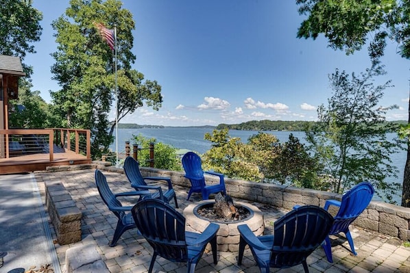 Sit out on the patio by the firepit overlooking the lake.