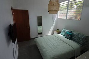 Your bed with mirror on the side