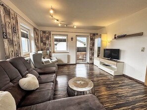 Furniture, Interior Design, Couch, Wood, Flooring, Ceiling, Room, Living Room, Floor, Apartment