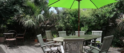 Umbrella, Property, Furniture, Outdoor Table, Table, Shade, Patio, Outdoor Furniture, Real Estate, House
