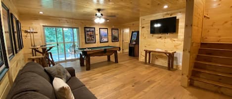 Comfortable game room. Fold out couch, pool table, lots of board games, arcades.