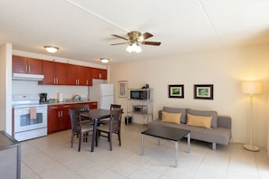 Furniture, Chair, Flooring, Ceiling Fan, Indoors