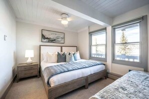 Welcome to the cozy elegance of the second bedroom! Here, comfort reigns supreme, whether you're nestled in a king-size bed fit for royalty or two twin beds for added flexibility. With plush bedding and tasteful decor, it's a space designed for restf