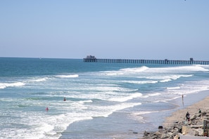 Enjoy 180 degree ocean views down to the Pier!