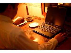 The room desk is spacious and ideal for business.