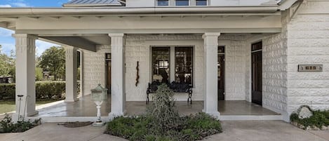  Basse Block home showing the llarge covered front porch