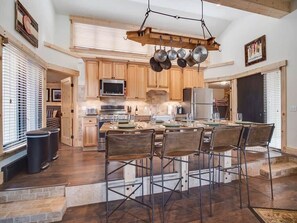 Kitchen and dining table with seating for 8