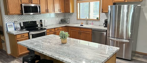 Updated kitchen with granite countertops