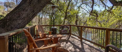 Enjoy wine or cofee on our tree top deck