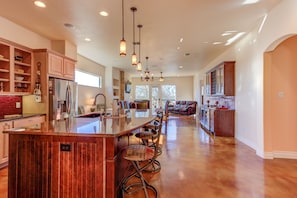 Kitchen, dining and living is an open floor plan on the first floor