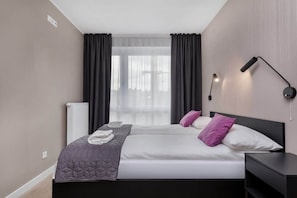 Cozy bedroom in the apartment.