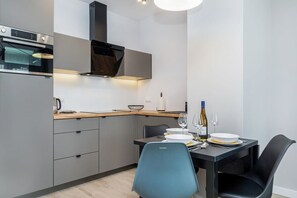 Kitchenette with dining table. 