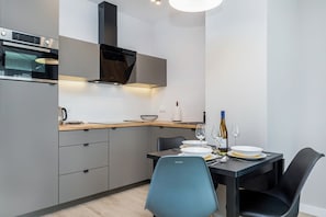 Kitchenette with dining table.